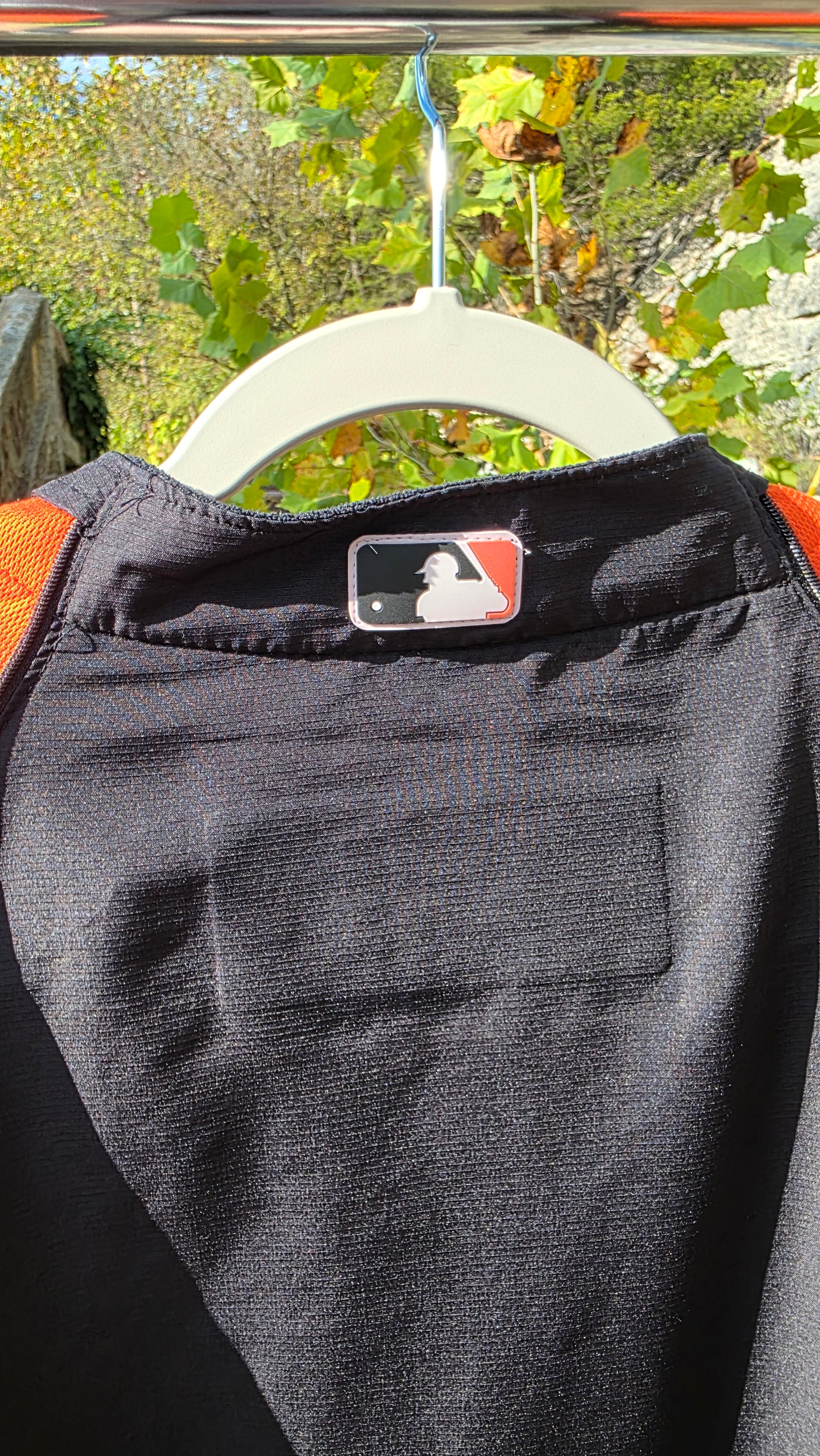 Orioles quarter-sleeve windbreaker. Size large